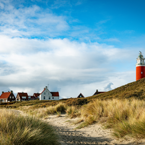 fotobehang van de vuurtoren op Texel - Airtexmania wandbekleding